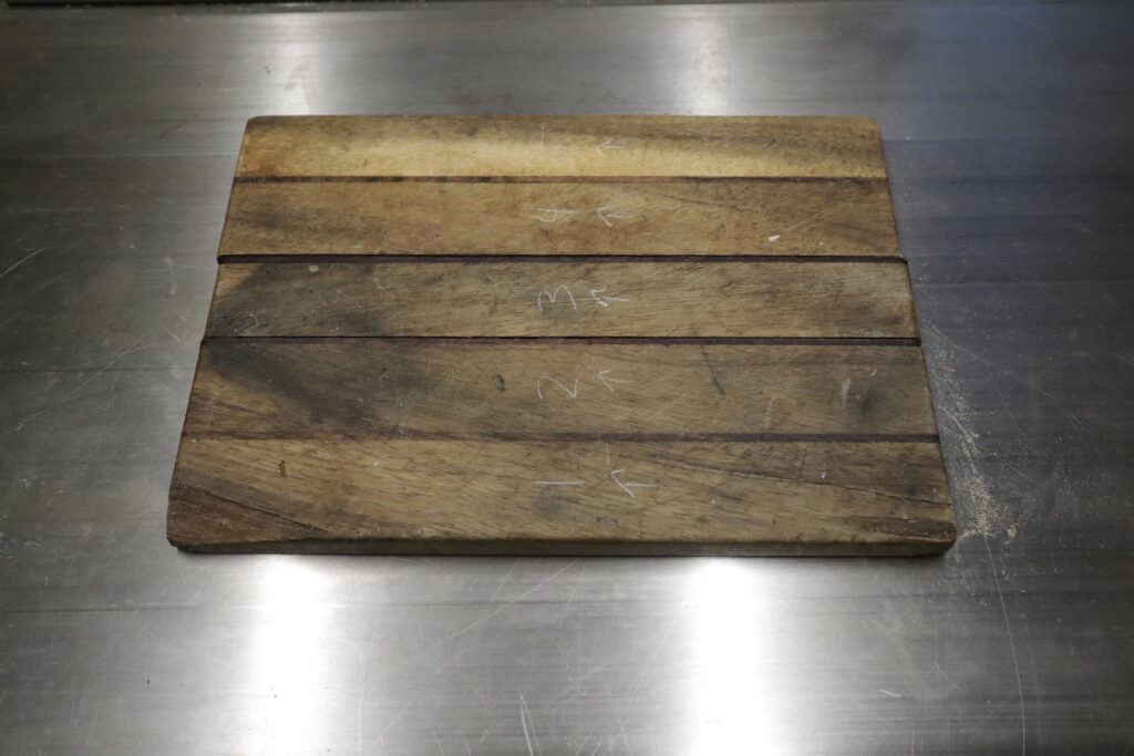The cutting board before repairs.